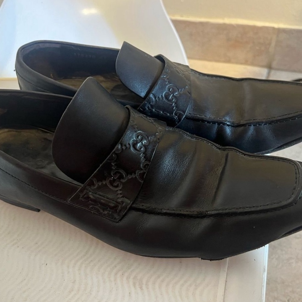 - Gucci Black Guccissima Leather Slip On Loafers